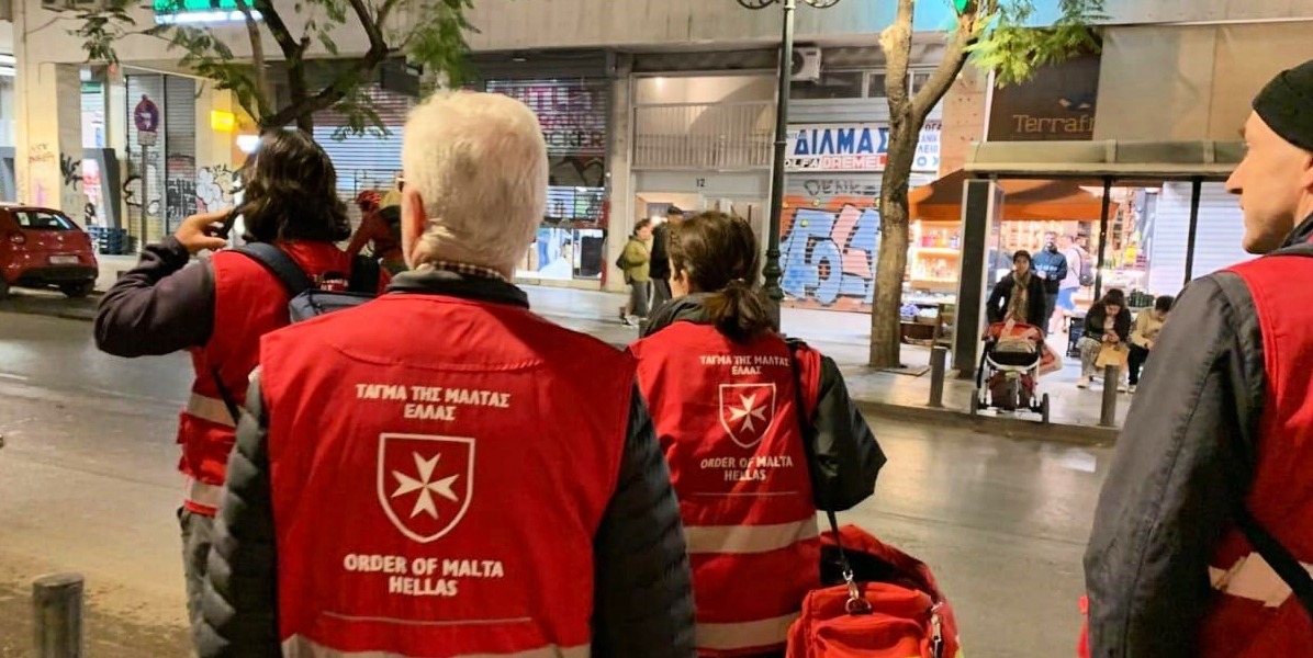 Ambassador Luca Rovati meets with the volunteers assisting the homeless in Athens